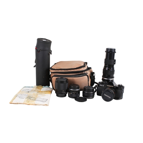 269 - Yashica FX-3 SLR 35mm film camera outfit. Including Yashica ML 50mm lens and a Soligor Telephoto f=3... 