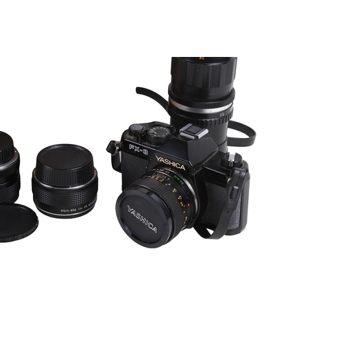 269 - Yashica FX-3 SLR 35mm film camera outfit. Including Yashica ML 50mm lens and a Soligor Telephoto f=3... 