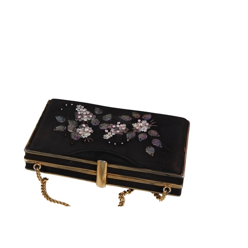 278 - A collection of women's fashion textiles. Including two handbags, a wallet and two silk scarves by A... 