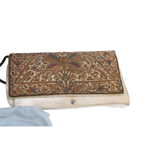 278 - A collection of women's fashion textiles. Including two handbags, a wallet and two silk scarves by A... 