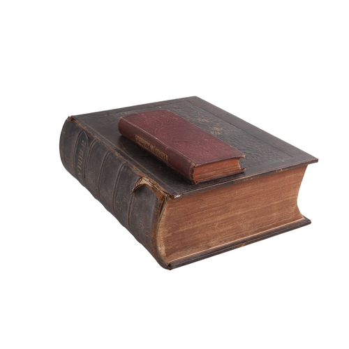 280 - Two antique books. Including a 19th century family Bible and Hoppus's Practical measurer.