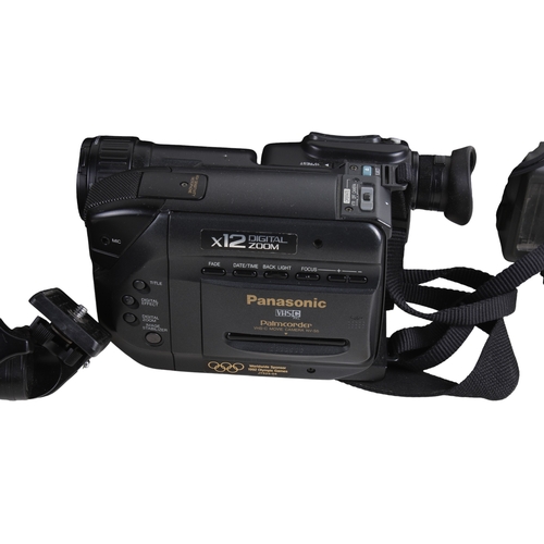 289 - A collection of mixed photography items. Including a Panasonic video camera, a tripod and filters, e... 