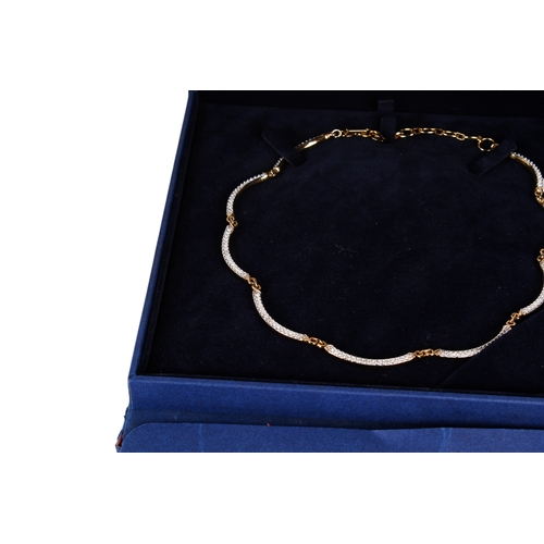 354 - A small group of Swarovski glass items. Including a heron and a necklace, both boxed, plus another n... 