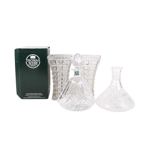 363 - Four items of glassware. Including a Thomas Webb Renaissance crystal decanters with stopper, boxed a... 