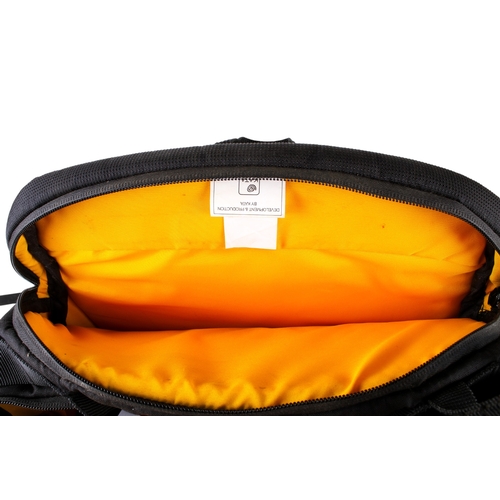 378 - A Jessop aluminum camera case and a Kata camera backpack. The case having a black plastic handle, H3... 