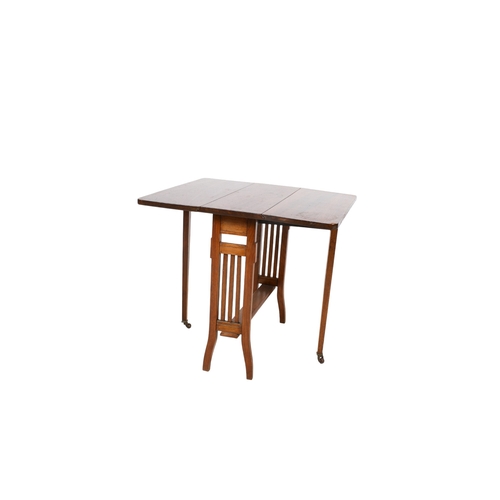 426 - An Edwardian mahogany Sutherland table. Having drop leaf sides raised on square tapering supports wi... 