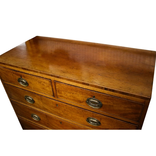 444 - A Victorian mahogany veneered chest of drawers. Having two short over three graduated drawers, with ... 