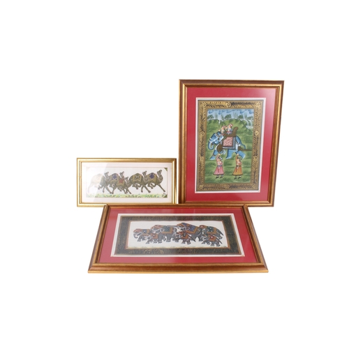 513 - A group of three assorted Eastern gouache paintings. Two depicting elephants the other camels. Frame... 