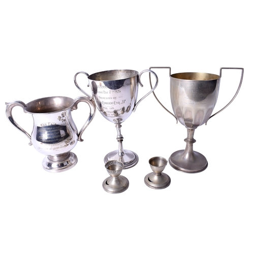101 - A collection of silverplated trophies. Including a twin-handled example engraved 'Tor Fair, 1925, be... 