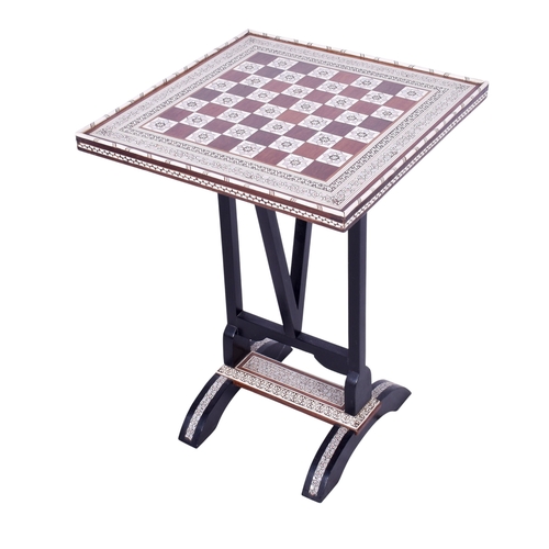 155 - A contemporary Anglo-Indian style chess board on a stand. The board inlaid with mother of pearl and ... 