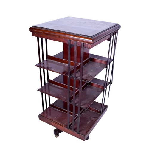 182 - A 19th century Victorian mahogany revolving bookcase. The bookcase having a squared chamfered edge t... 