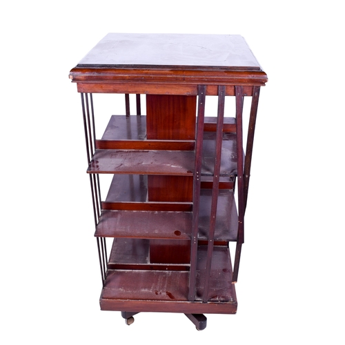 182 - A 19th century Victorian mahogany revolving bookcase. The bookcase having a squared chamfered edge t... 