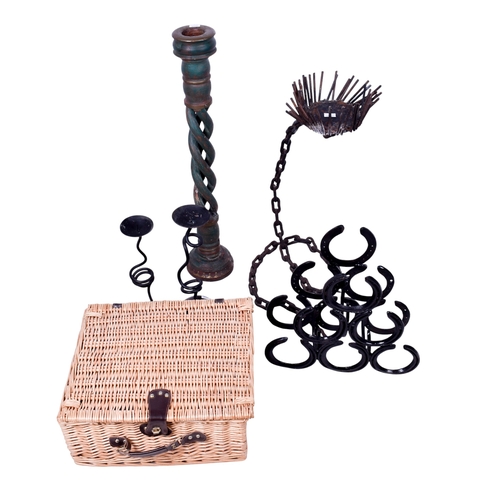 210 - An assortment of collectables. Including a large wooden candlestick, a bottle rack modelled from hor... 