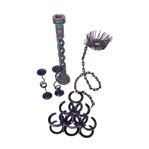 210 - An assortment of collectables. Including a large wooden candlestick, a bottle rack modelled from hor... 