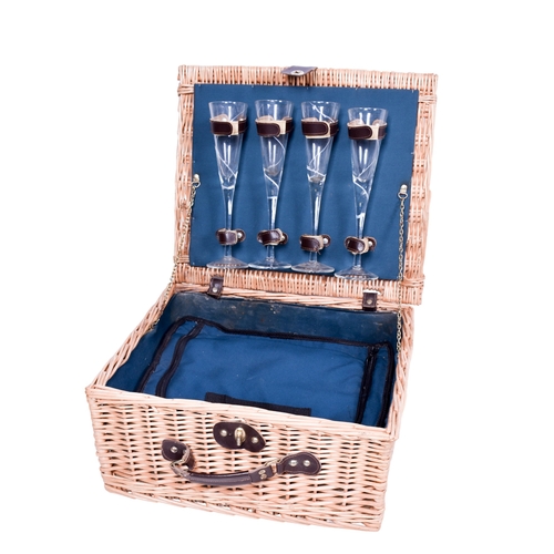 210 - An assortment of collectables. Including a large wooden candlestick, a bottle rack modelled from hor... 