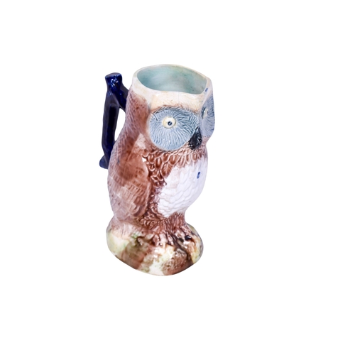 235 - A majolica jug modelled as an owl. Unsigned, H22.5cm.