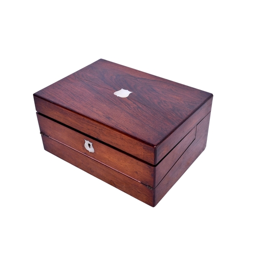 238 - A Victorian rosewood sewing/writing box. The exterior having a mother of pearl escutcheon, the inter... 