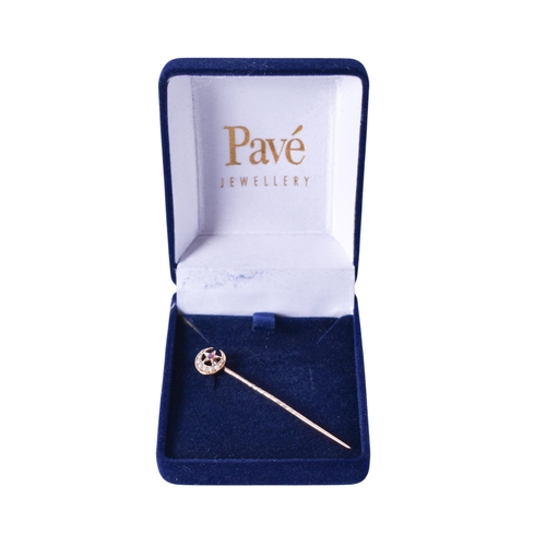28 - A yellow metal tie pin. Topped with a stone and pearl set star and crescent moon, marked 15ct to ver... 
