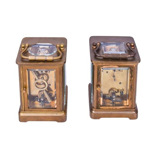 308 - Two brass cased carriage clocks. Both having white enamel dials with Roman numerals, glazed panels t... 