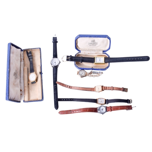 35 - A 9ct gold locket and chain. The oval locket with engraved scroll decoration and blank central paper... 