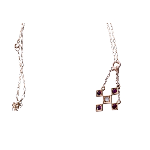 36 - An early 20th century 18ct gold (stamped) pendant. Set centrally with one old cut diamond of 0.05 ca... 