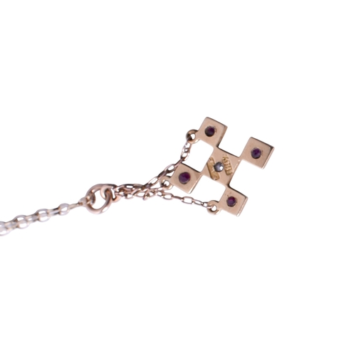 36 - An early 20th century 18ct gold (stamped) pendant. Set centrally with one old cut diamond of 0.05 ca... 