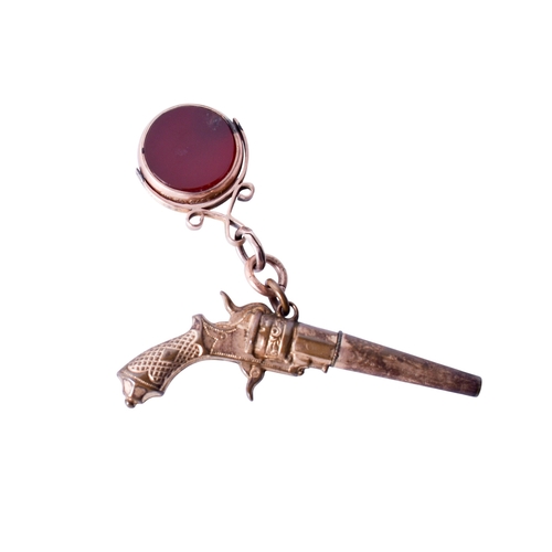 37 - A 9ct gold fob with a gilt metal pendant firearm. The fob set with bloodstone and carnelian in a hal... 