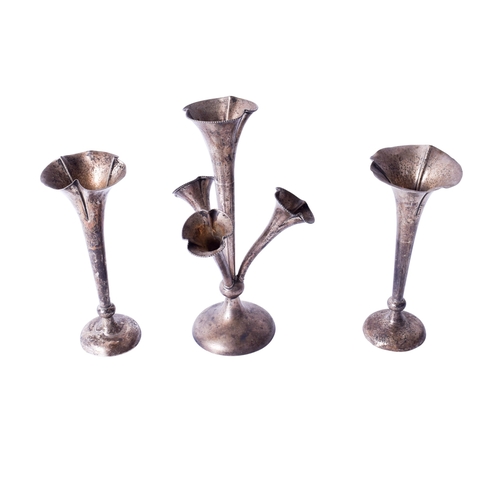 4 - A pair of vintage silver weighted tulip vases and a silver epergne. The first with trefoil rim, thes... 