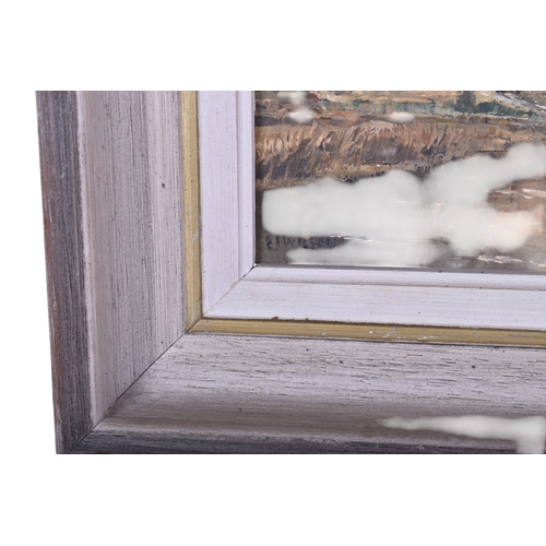 616 - A 20th century oil painting. Signed 'E J Wilson', depicting a cottage beside a river, 16.5cm x 22.5c... 