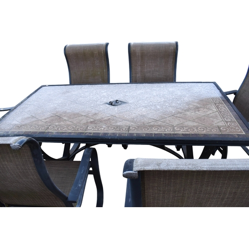 637 - A garden table and set of six chairs. The rectangular metal framed table having a tiled surface, H73... 