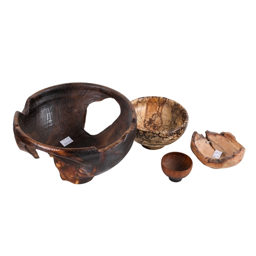 346 - Four assorted wooden hand turned bowls. Various sizes and types of wood. Largest diameter 24cm