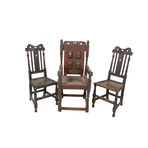 405 - Three antique carved oak chairs. Consisting of a wainscot panel-back chair and a pair of high back '... 