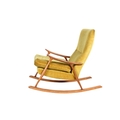 A circa 1962 John M. Haynes open arm rocking chair. Having green button ...