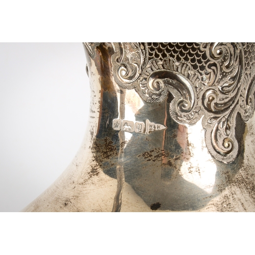 1 - An early 20th century Walker & Hall silver coffee pot. With raised scrolling leaf pattern and engrav... 