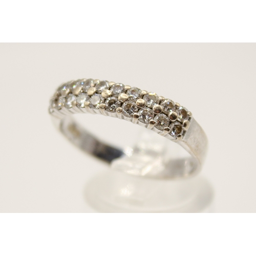 106 - An 18ct white gold (tested) and diamond dress ring. Set with round brilliant cut diamonds of 0.80 ca... 