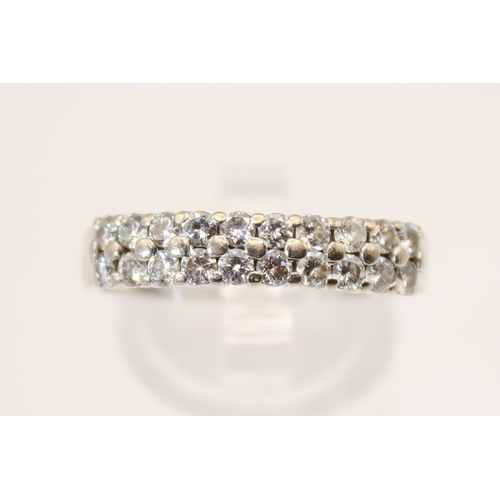 106 - An 18ct white gold (tested) and diamond dress ring. Set with round brilliant cut diamonds of 0.80 ca... 