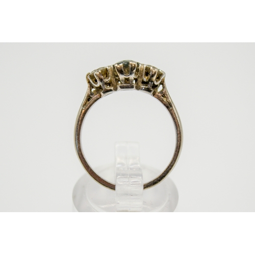 119 - An 18ct gold, sapphire and diamond ring. The central stone circa 0.6ct estimated weight, the diamond... 