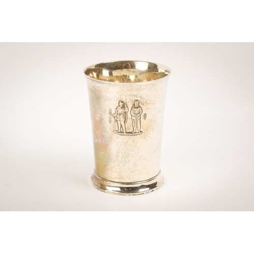 13 - An early 20th century silver beaker. Of lightly tapered form, decorated with  The National Rifle Ass... 