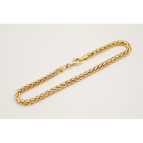 140 - A 9ct gold rope chain bracelet. Hallmarked and marked 9k, L18cm, weight 3.3g.