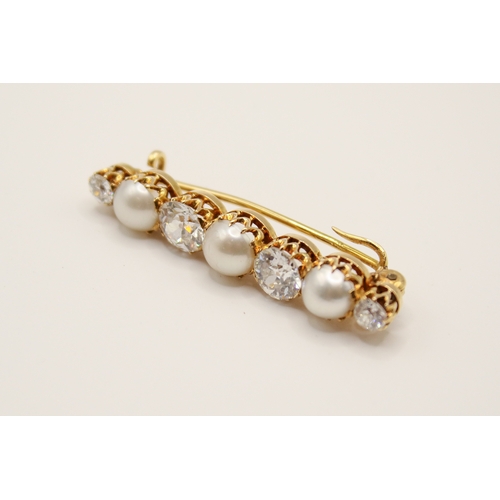 153 - An antique diamond and half cultured pearl set bar brooch. Set with four old brilliant cut diamonds ... 