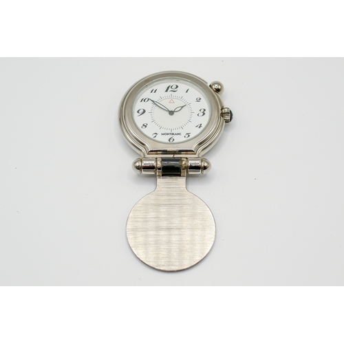 204 - A Montblanc pocket travel alarm clock. Having a white dial, Arabic numerals, stainless steel case wi... 