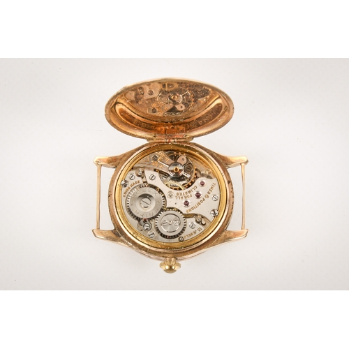 211 - A 1920s 9ct gold Rolex wristwatch, without strap. Black Arabic numerals and subsidiary dial to the e... 