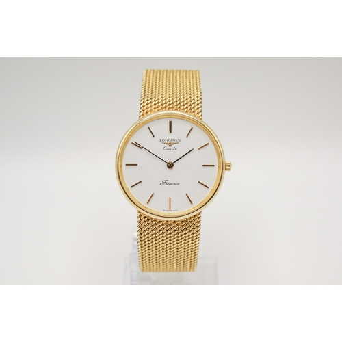 215 - A 9ct gold Longines Presence quartz wristwatch. Model 35002, with gilt markers to the white face, ma... 