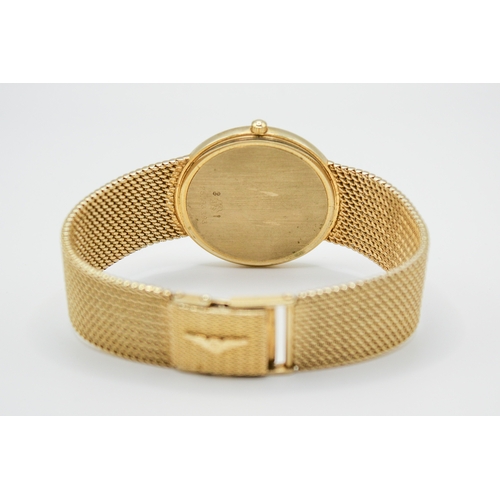 215 - A 9ct gold Longines Presence quartz wristwatch. Model 35002, with gilt markers to the white face, ma... 