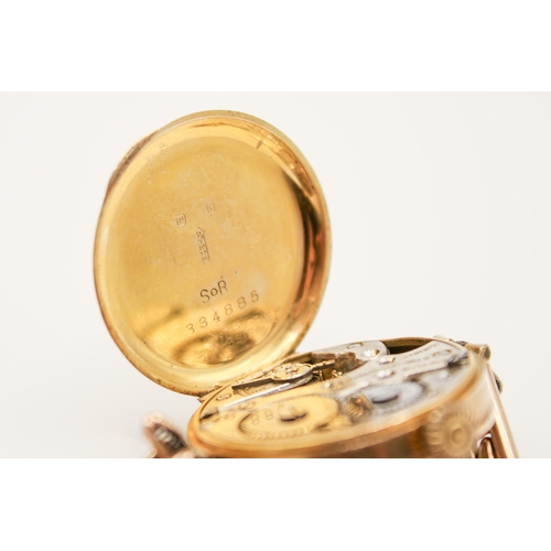 233 - A 9ct gold cased lady's watch. Manual movement, the silvered dial with Arabic numerals, in a hallmar... 