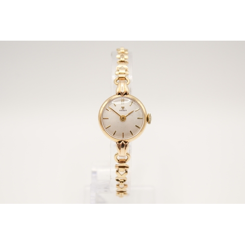 238 - A 9ct gold vintage lady's Tissot dress watch. The round face with gilt marker, hallmarked inside bac... 