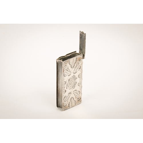 24 - A Dutch silver  book form vesta case. With engraved decoration and book spine, maker's mark to top l... 