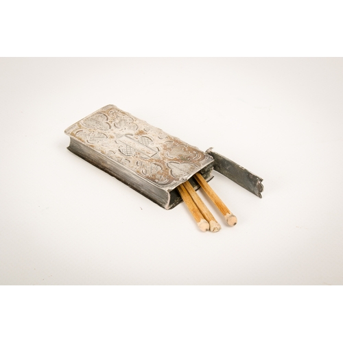 24 - A Dutch silver  book form vesta case. With engraved decoration and book spine, maker's mark to top l... 