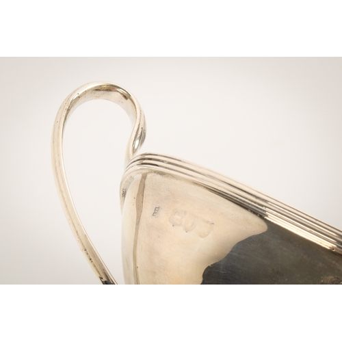 27 - A pair of late 19th century twin-handled silver dishes. With reeded decoration to handles, rim and f... 