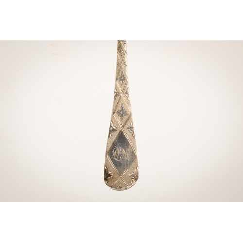 44 - A pair of George III silver berry spoons. The gilt bowls with repoussé decoration of a pineapple and... 